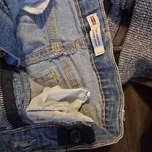 Levi's Light Blue Denim with Black Button